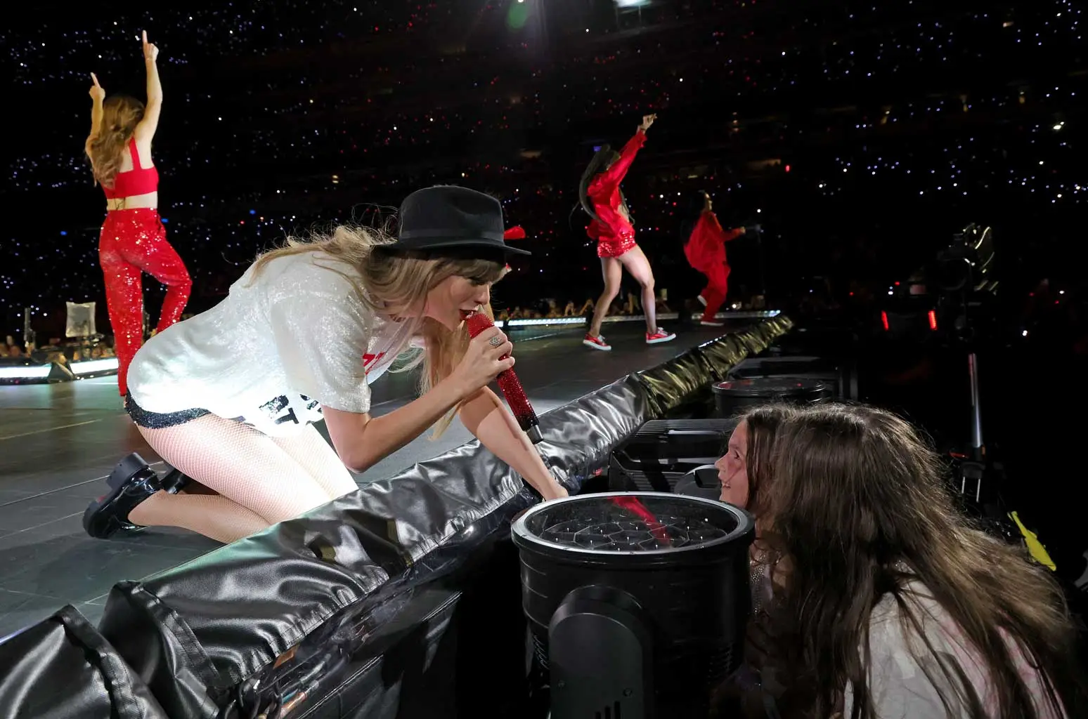This Adorable Video of Taylor Swift Giving Her "22" Hat to a Young Girl With Cancer Will Make You Weep Full Story below.
